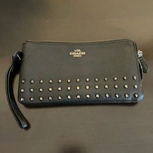 Coach wristlet with studs